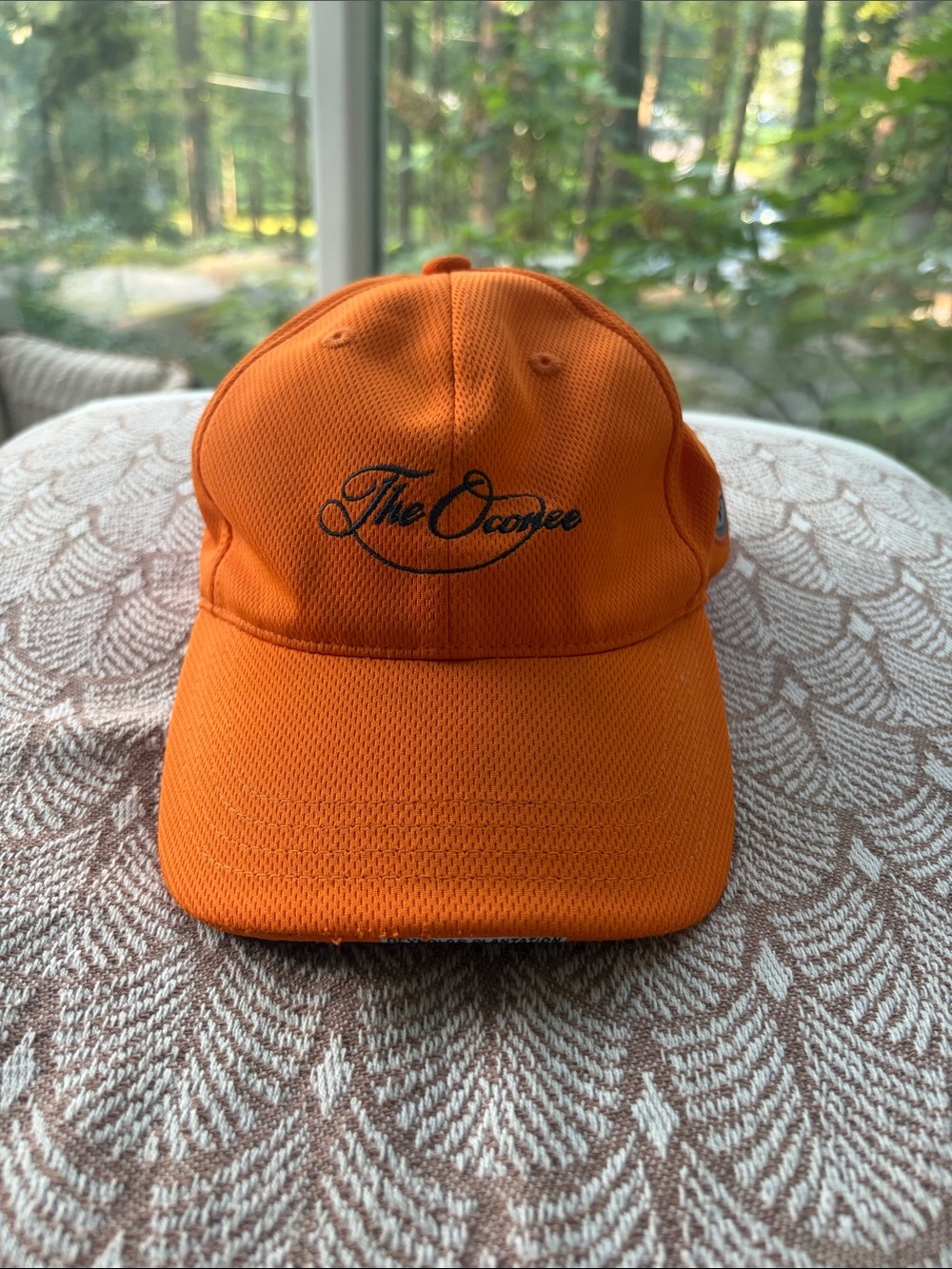 Hat from the Oconee Course at Reynolds Plantation. Orange mesh.